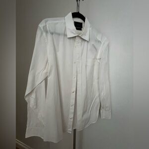 Men’s Faconnable white dress shirt with pocket.
